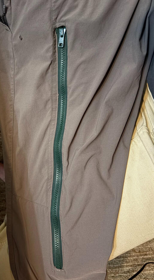 Zipper sewn into side of pants for ventilation